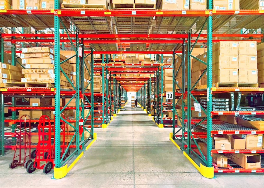 Warehouse shelves stacked with inventory boxes